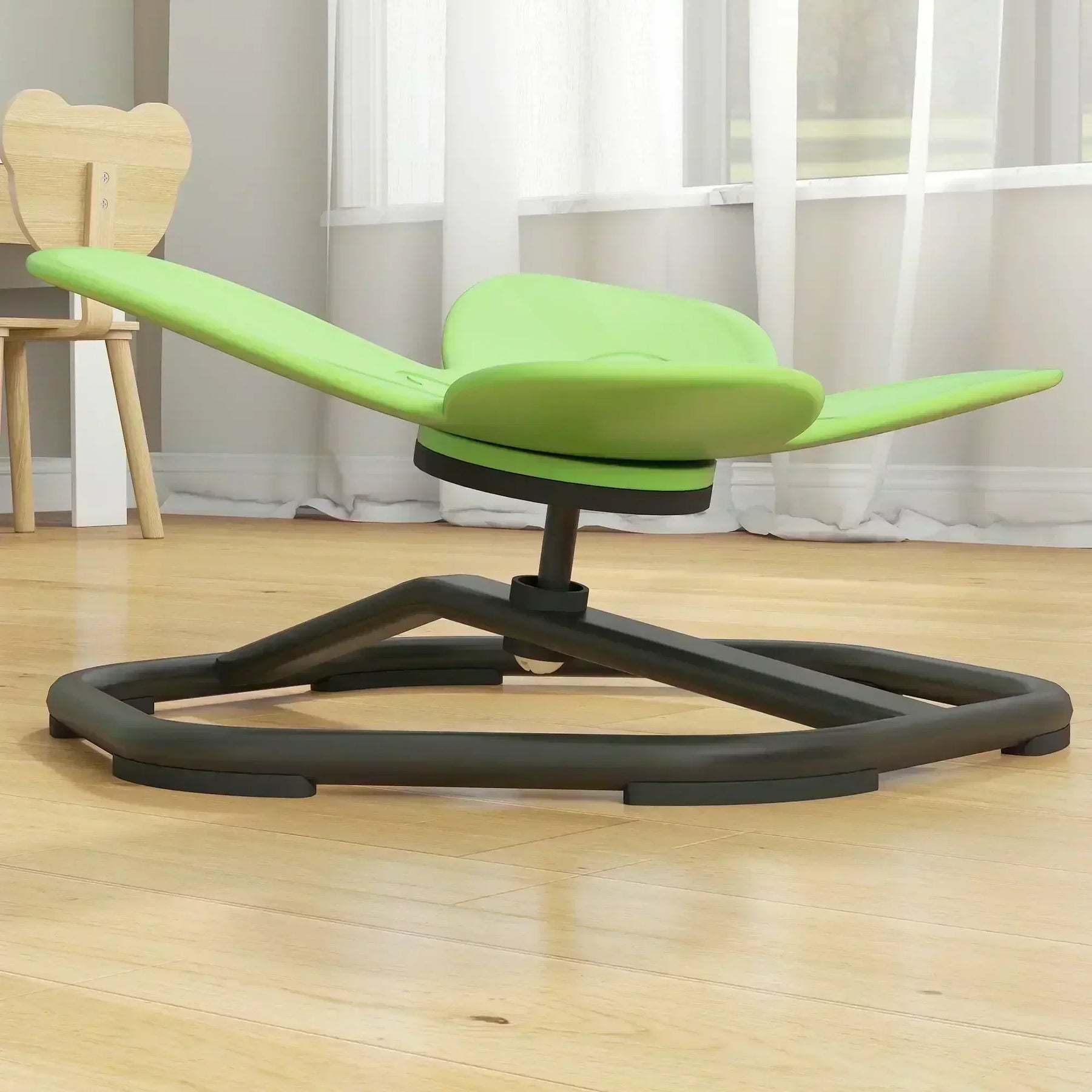 Green sensory play platform for kids in a bright, modern room with wood floors.
