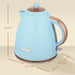 Blue electric kettle with brown accents and dimensions displayed on a beige background