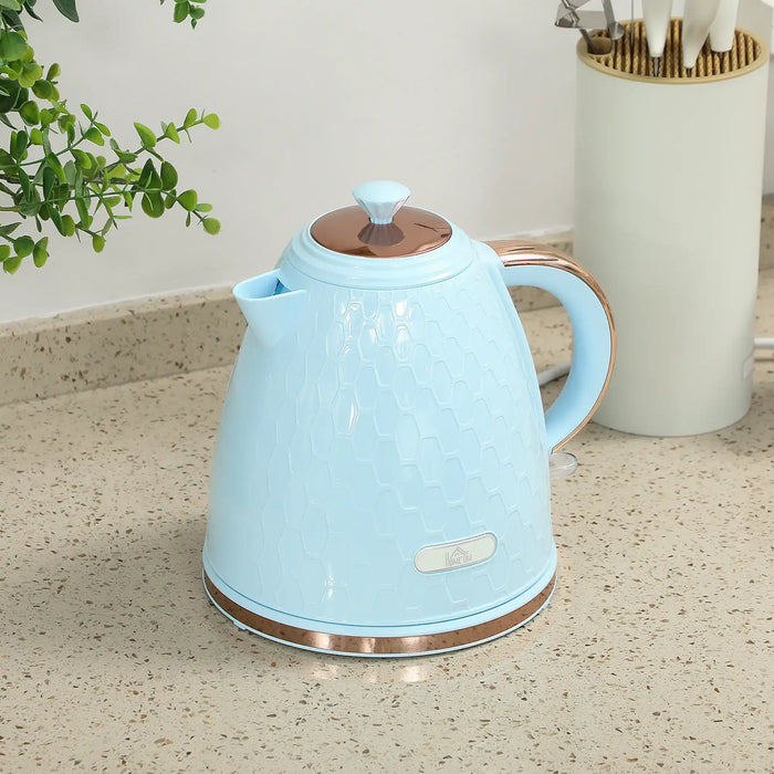 Light blue electric kettle on a kitchen counter with a plant and container in the background.