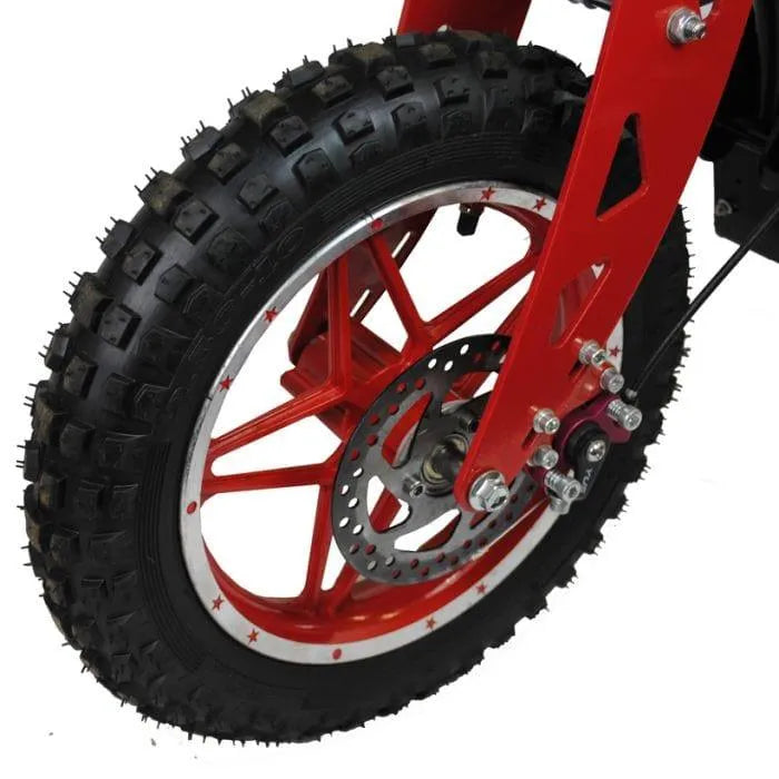 Close-up of electric scooter rugged tire with red alloy wheel and disc brake