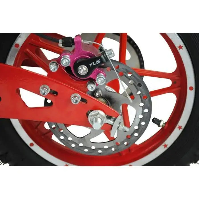 Close-up of red electric scooter wheel with disc brake and YUS caliper