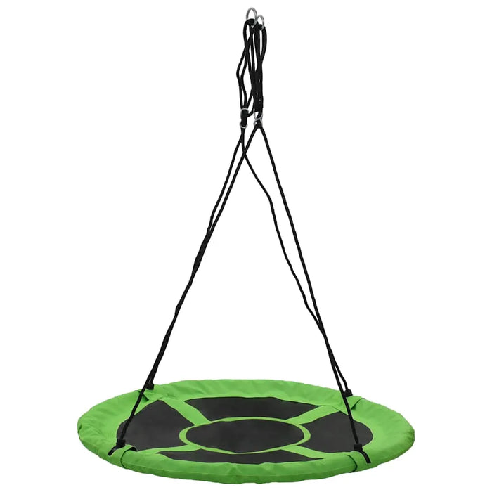 Green round saucer tree swing with black ropes on a white background