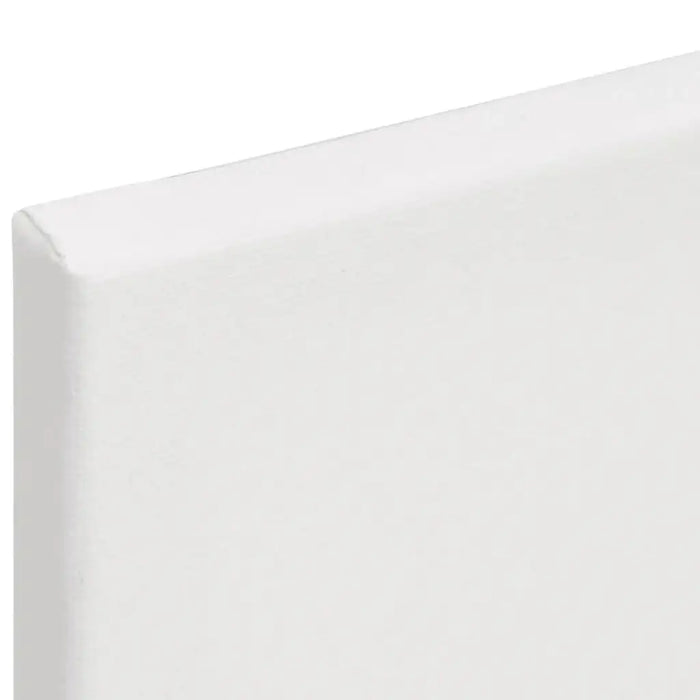 Close-up of blank stretched canvas for professional painting, white surface, square edge