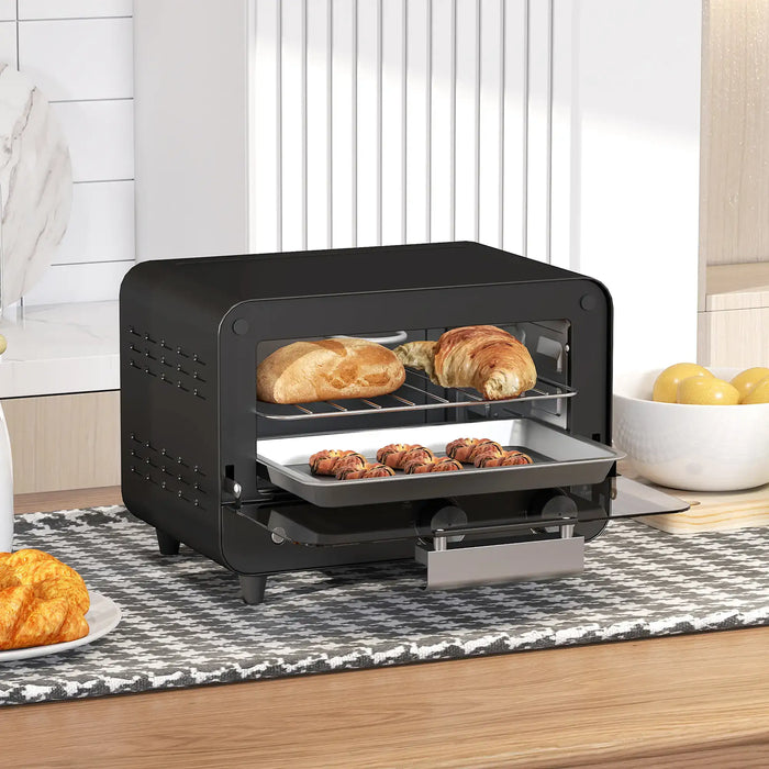 Black toaster oven with food on a wooden table