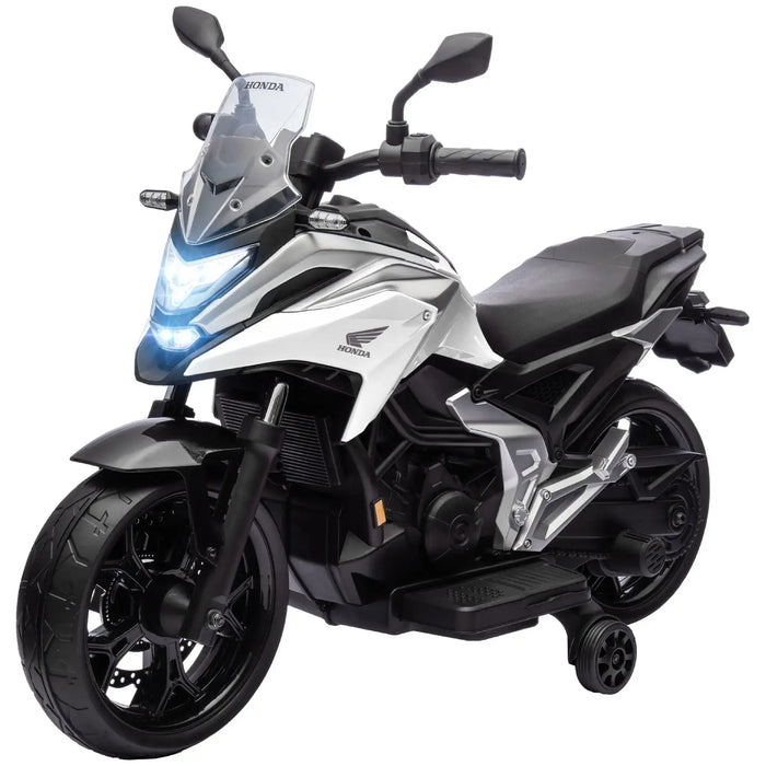 White and black Honda kids electric motorcycle with training wheels and LED headlights