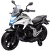 White and black Honda kids electric motorcycle with training wheels and LED headlights