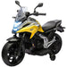 Yellow and black Honda kids electric motorcycle with training wheels and LED headlights
