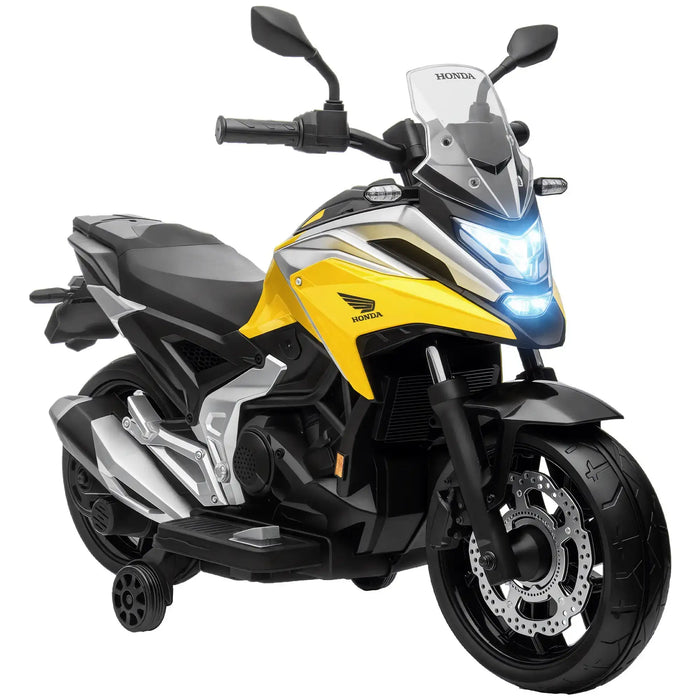 Yellow and black Honda electric kids motorcycle with training wheels and LED headlight