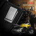 Close-up of a metallic foot pedal with a blurred yellow Honda motorcycle and text 'Foot Pedal Real Driving Experience'