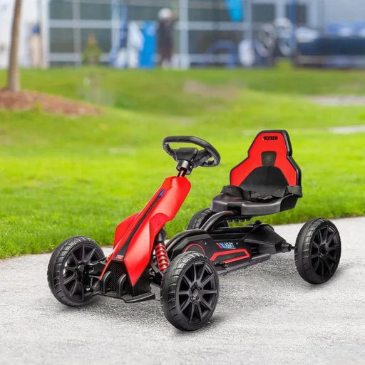 Red 12V kids electric go-kart with black wheels on outdoor path