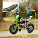 Green and white kids' electric dirt bike with training wheels and dimension labels in outdoor setting.