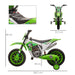 Green and white children's dirt bike with dimensions displayed