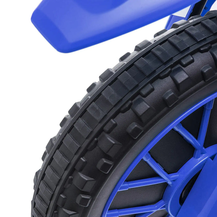 Close-up of blue kids electric ride-on motorbike wheel with knobby black tire