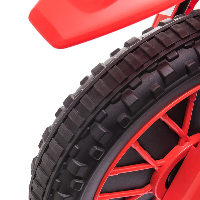 Close-up of red and black tire on 12V kids electric ride-on motorbike