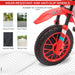 Red electric kids ride-on motorbike front wheel with anti-slip tread, suitable for cement, brick, asphalt, and wood surfaces.