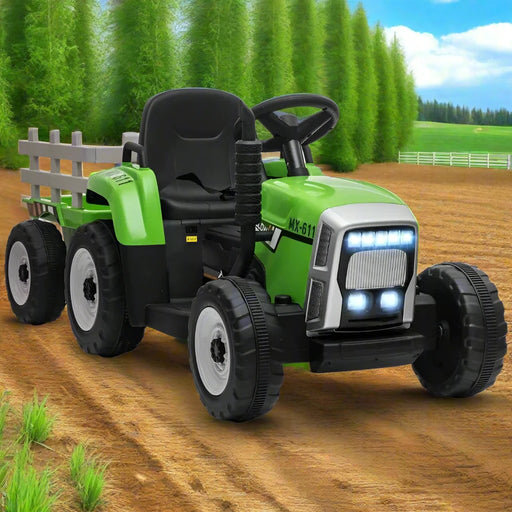 12V kids electric green ride-on tractor with detachable trailer on a dirt path