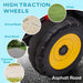 Close-up of high traction wheel on kids ride-on tractor, suitable for grass, gravel, brick, concrete, and asphalt roads.