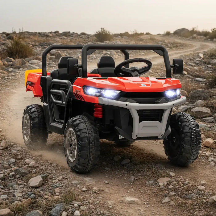 Red 12V kids electric ride-on UTV with headlights on rocky dirt trail outdoors