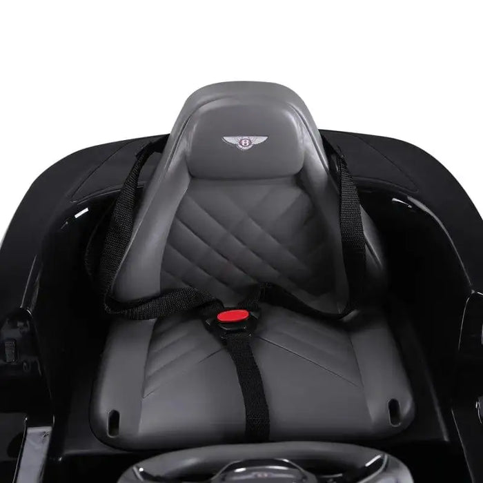 Kids Bentley GT electric ride-on car seat with safety harness and Bentley logo