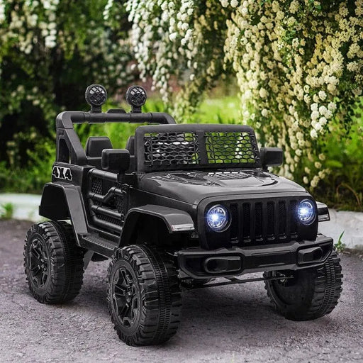 Black 12V kids off-road ride-on car with working headlights and 4x4 tires outdoors