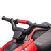 Close-up of red 12V kids' ride-on quad ATV bike handlebars and seat