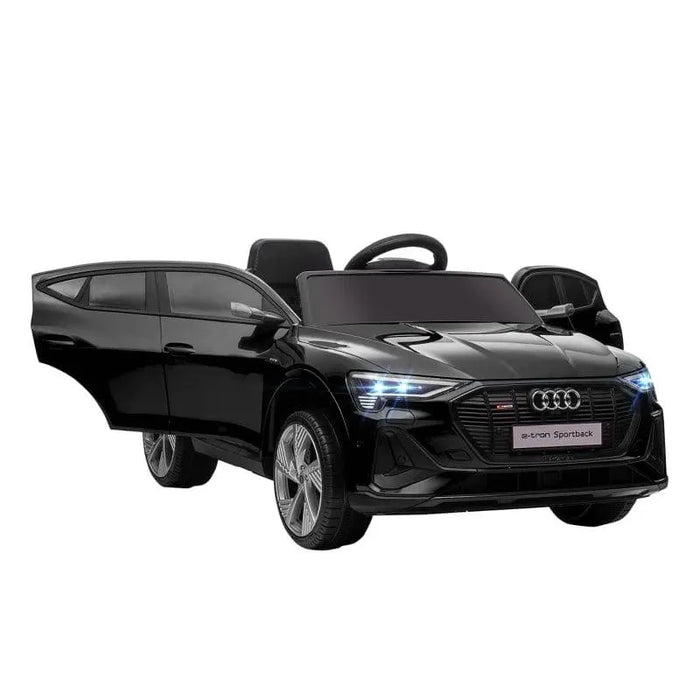 Black 12V Audi e-tron kids electric ride-on car with open doors and working headlights