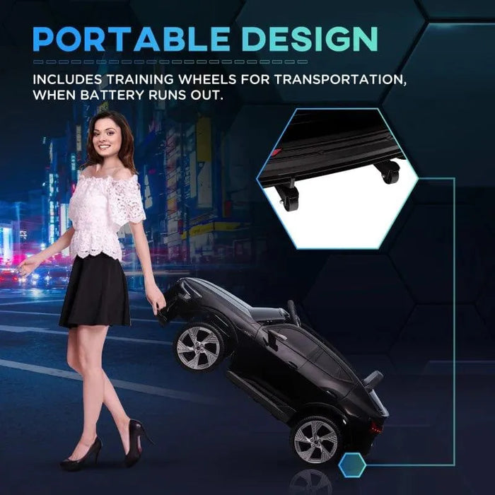 Woman pulling a black Audi e-tron kids electric ride-on car with training wheels, city background