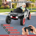 Child driving black 12V Audi e-tron kids electric ride-on car with remote control and LED lights