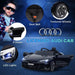 Black 12V licensed Audi RS e-tron GT kids ride-on car with LED lights, seat belt, textured wheels, and open doors.