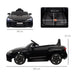 Black 12V Audi RS e-tron GT kids ride-on car with LED lights, music, and seat belt dimensions.