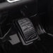 Close-up of black pedal in 12V Audi RS e-tron GT kids ride-on car interior
