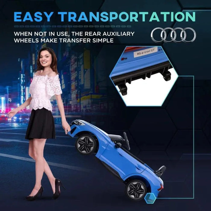 Woman pulls blue 12V Audi RS e-tron GT kids ride-on car with rear auxiliary wheels.