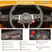 Audi TT RS kids ride-on car dashboard with steering wheel, buttons, and control switches