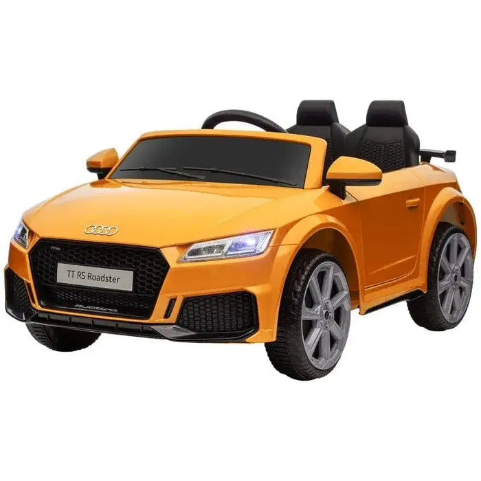 Yellow Audi TT RS kids ride-on car with headlights and remote control features