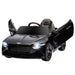 Black 12V Bentley Bacalar kids electric ride-on car with butterfly doors open and headlights on
