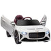 White 12V Bentley Bacalar kids electric ride-on car with open butterfly doors and headlights on