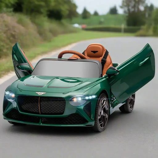 Green 12V Bentley Bacalar kids ride-on car with butterfly doors open on a road