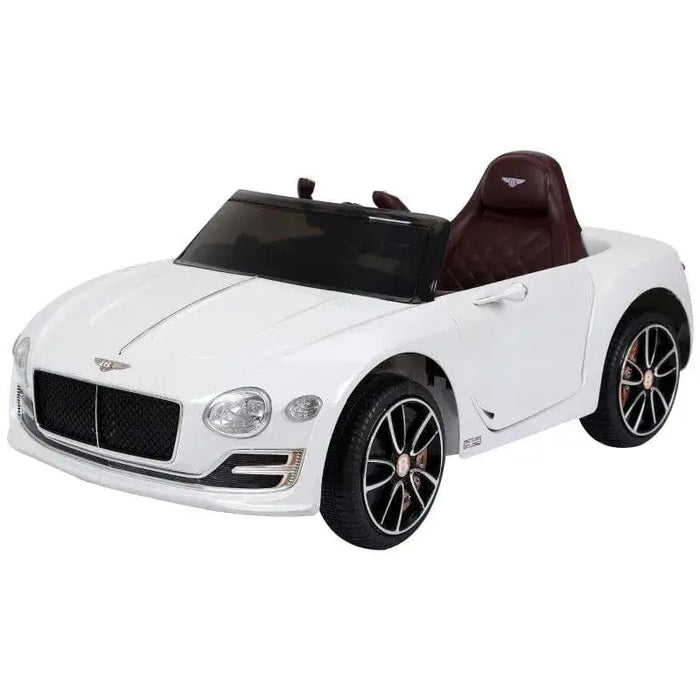 White 12V Bentley kids electric ride on car with black wheels and brown seat