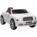 White 12V Bentley Mulsanne kids ride-on car with chrome accents, lights on, and Bentley logo