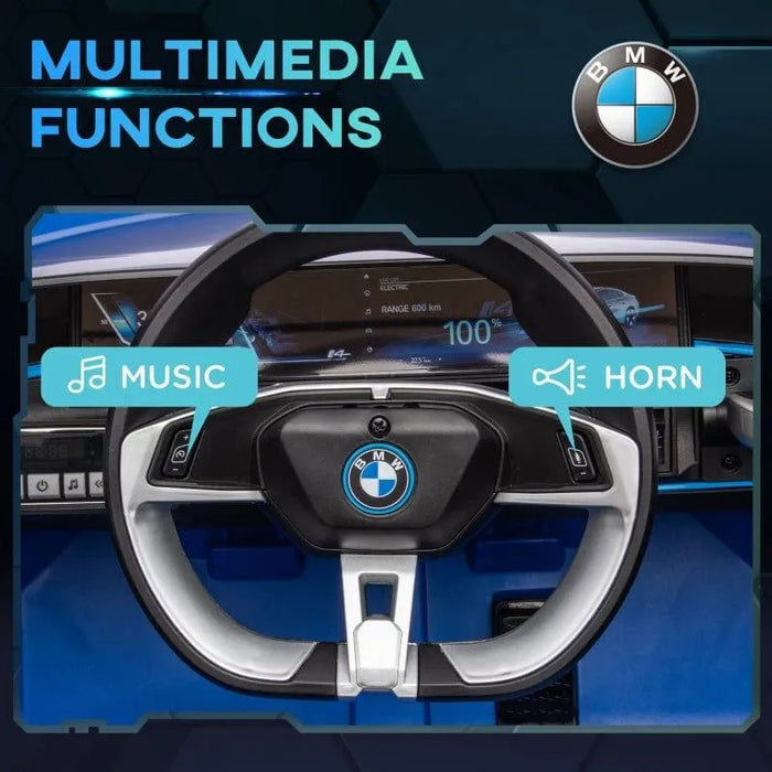 BMW i4 kids ride-on car dashboard with multimedia music and horn functions highlighted
