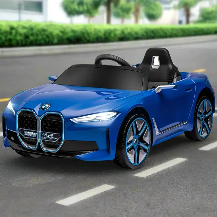 Blue 12V BMW i4 kids ride on car with remote, music, lights, driving on street