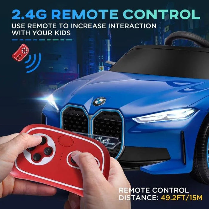 Blue 12V BMW i4 kids ride on car with remote control, headlights on, shown in use