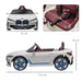 12V licensed BMW i4 kids ride-on car white, with seatbelt and dimensions displayed
