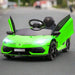 Green 12V Lamborghini Aventador kids ride-on car with butterfly doors open, outdoor setting