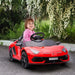 Child riding a red 12V Lamborghini Aventador kids ride-on car outdoors with flowers in background