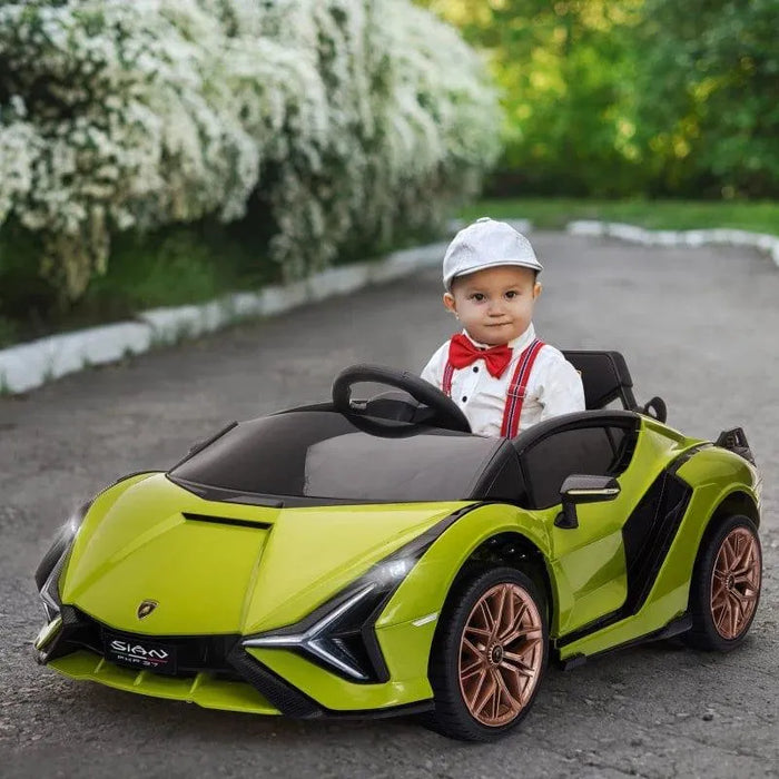 Child driving green 12V Lamborghini Sian kids electric ride-on car outdoors