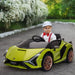 Child driving green 12V Lamborghini Sian kids electric ride-on car outdoors