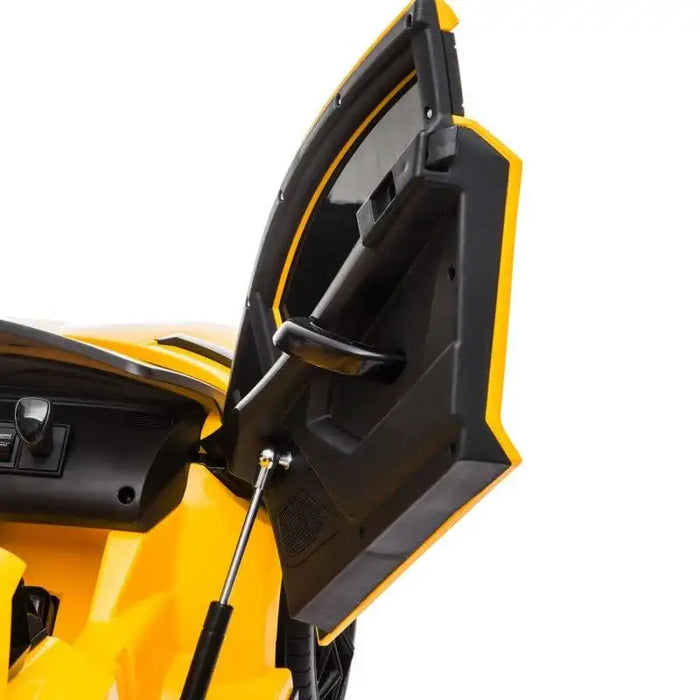 Yellow Lamborghini SVJ kids ride-on car close-up open scissor door and dashboard