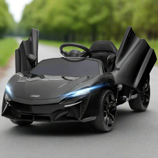 Black 12V McLaren kids electric ride-on car with butterfly doors and lights open on road