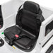 Black seat with safety belt in a white Mercedes-Benz G500 kids' electric ride-on jeep